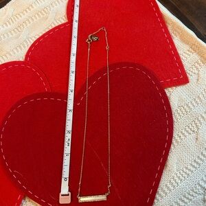 Elegant Gold Necklace with White Accents